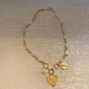 Charm necklace gold. Brand designed by Marci. Never worn